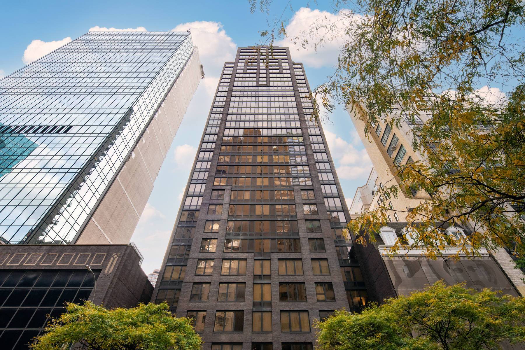 Building facade looking up to sky at 150 East 57th Street